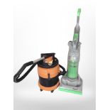 A Vax vacuum cleaner and a Dyson upright vacuum cleaner.