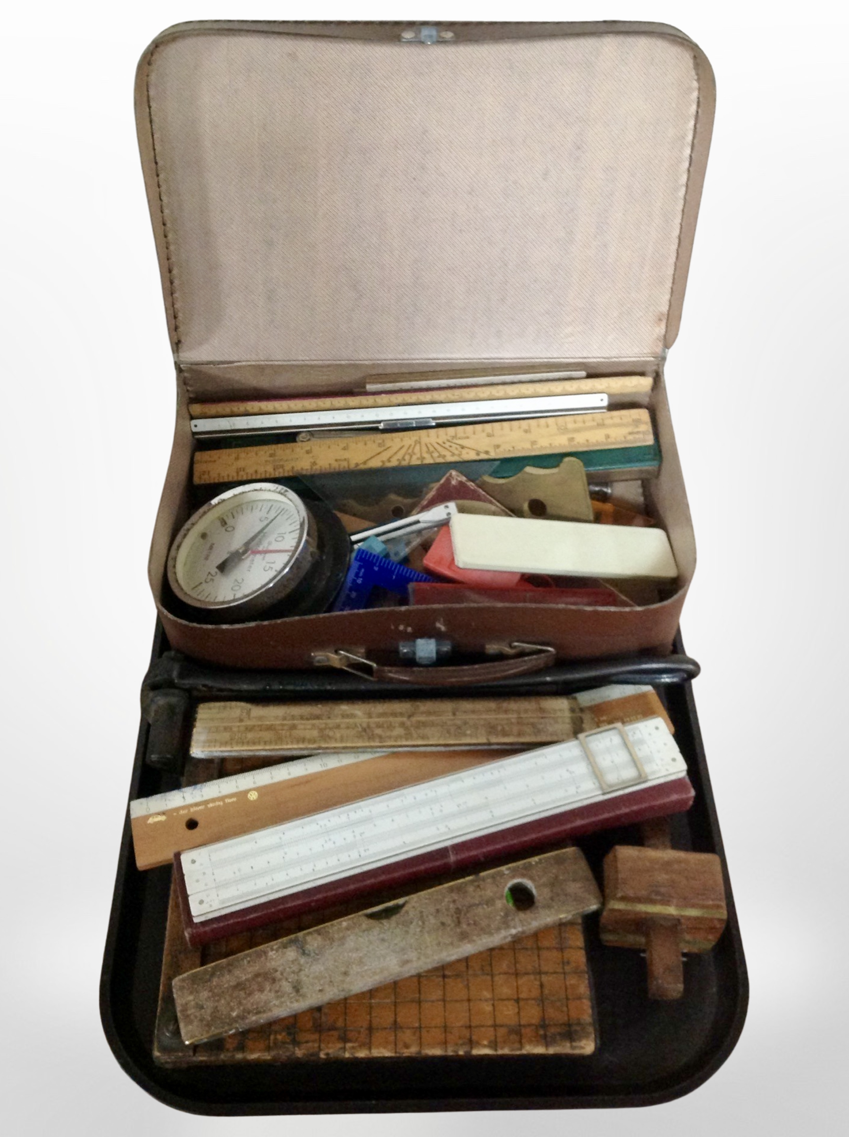 A group of vintage rulers, brass-mounted spirit level by Rabone and Sons, hydrometer,