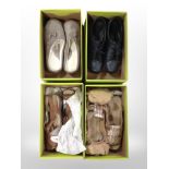 A crate containing several pairs of ladies Hotter shoes.