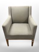 A 20th century Danish oak framed armchair in grey upholstery