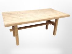 An early 20th century pine rectangular table,