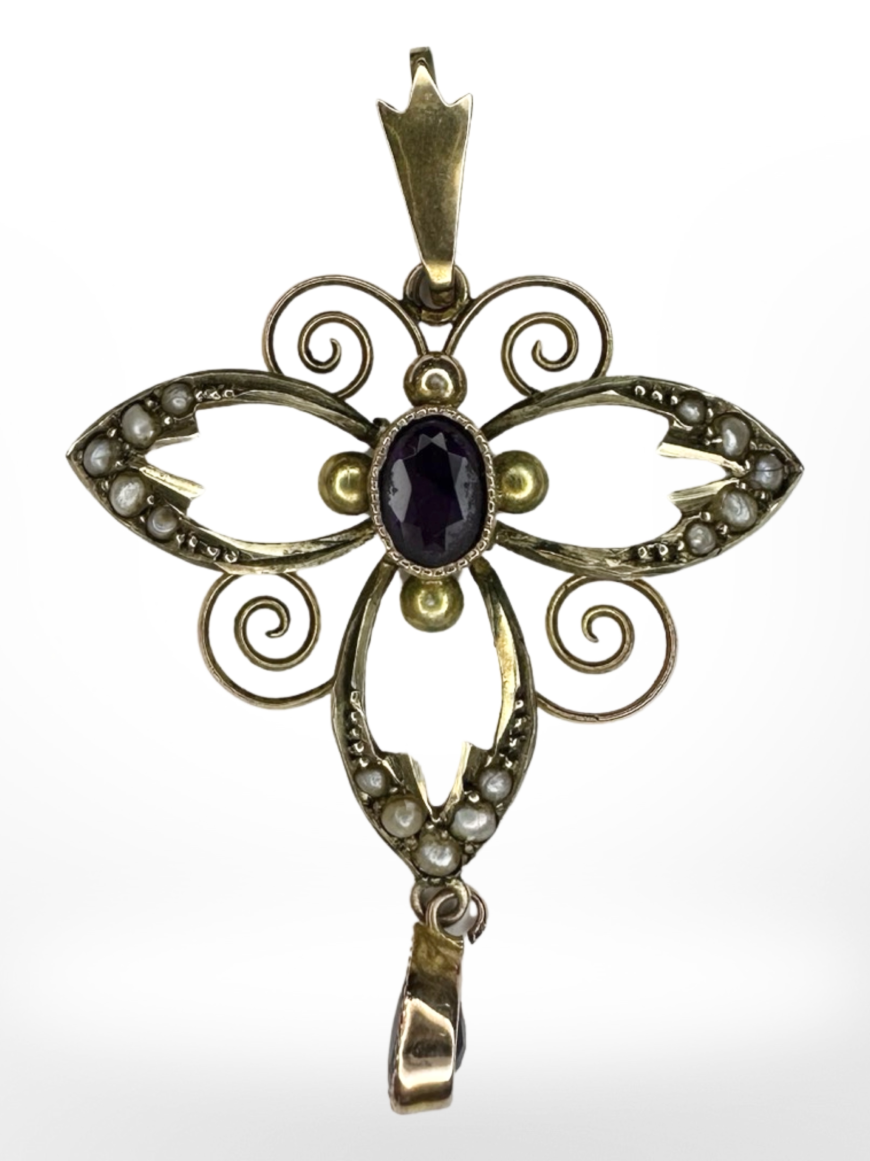 An Edwardian 9ct yellow gold seed pearl and amethyst pendant, length including bale 41 mm.