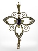 An Edwardian 9ct yellow gold seed pearl and amethyst pendant, length including bale 41 mm.