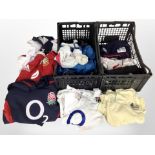 Two crates containing sports clothing for rugby, golf, Newcastle United tie, etc.