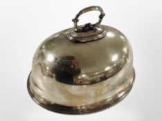 A silver-plated food cover, height 15cm.
