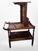 An early 20th century serving trolley on castors and an oak reading table