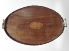 A Victorian inlaid mahogany twin-handled oval tray, width 58cm.