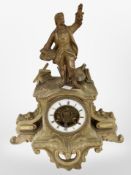 A 19th century glass figural mantel clock with pendulum, height 33cm.