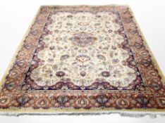 A machine made carpet of Persian Tabriz design,