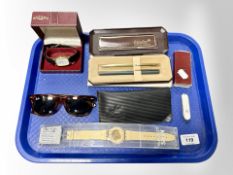 A tray containing Rotary wristwatch on leather strap, boxed, Ray Ban sunglasses, a Swatch watch,