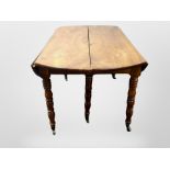 A 19th century mahogany drop leaf dining table and four dining chairs