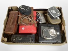 A collection of vintage cameras and handheld video cameras including Quarz, Keystone, Eymig, etc.