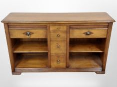 A reproduction stained pine sideboard, width 120cm.