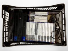 Two Sony Playstation 2 consoles, a quantity of games, etc.
