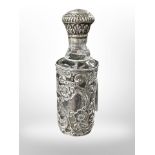 A silver-mounted glass bottle, height 13cm.