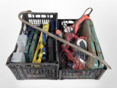 Two crates containing power and hand tools, including Einhell planer, angle grinder, spirit level,