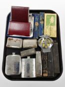 A group of antique cutthroat razors in boxes, hip flask, snuffboxes, a magnifying glass,