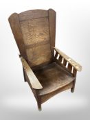 A late 19th century American style Arts and Crafts child's oak armchair
