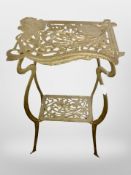 A brass Art Nouveau-style plant stand, height 73cm.