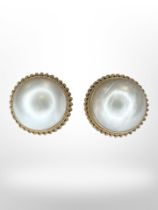 A pair of mabe pearl earrings mounted in 9ct yellow gold, each diameter 9.34 mm.