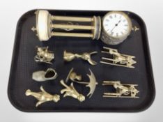 A gilt brass and alabaster mantel clock, together with a small quantity of brass ornaments.