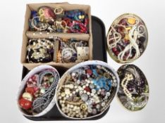 A tray containing a large collection of costume jewellery in several boxes including faux pearls,