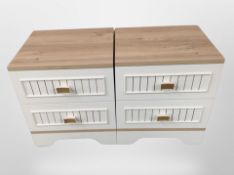 A pair of contemporary two-drawer bedside chests, width 44cm.