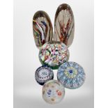 Four Millefiore glass paperweights including Perthshire example and two further paperweights.