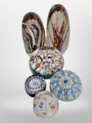 Four Millefiore glass paperweights including Perthshire example and two further paperweights.