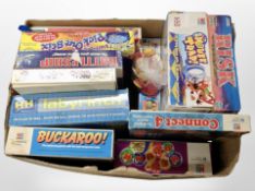 A box of assorted boardgames, a Scalextric racing set, a pinball machine in box.