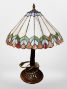 A Tiffany style patinated metal table lamp,