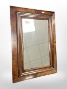 A 19th century continental walnut mirror, 59cm x 43cm.