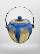 A Shelley ceramic lidded biscuit barrel with chrome swing handle.
