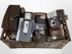 A collection of vintage cameras and handheld video cameras including Fujica, Canon, etc.