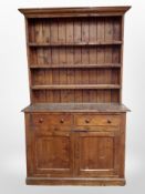 A Victorian pine kitchen dresser,