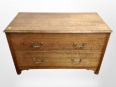 Two Edwardian oak chests of two drawers,