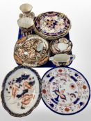 A collection of Imari porcelain tea china and dinner plates including Crown Derby.