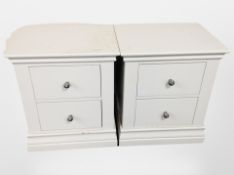 A pair of contemporary two-drawer bedside chests, width 53cm.