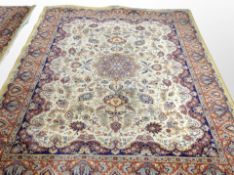 A machine made carpet of Persian Tabriz design,