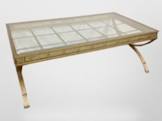A contemporary metal and glass rectangular coffee table, length 127cm.