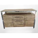 A contemporary chrome and walnut effect sideboard, length 127cm.