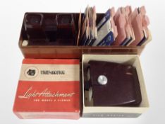 A View-Master Bakelite slide viewer, further boxed light attachment, and a quantity of reels.
