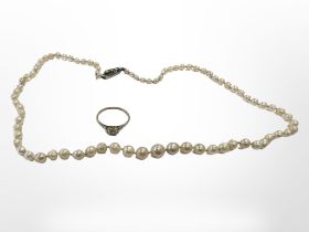 An antique graduated cultured pearl necklace with marcasite clasp,