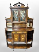 A Victorian rosewood and satinwood inlaid sideboard, with mirrored cabinet above,