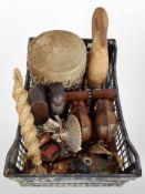 A collection of ethnographic items, including carved busts, pair of elephant bookends,