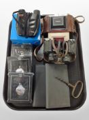 A group of collectables including antique and later binoculars, Netar camera, an antique corkscrew,