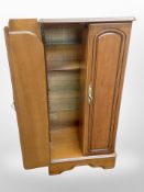 A contemporary double door entertainment cabinet,