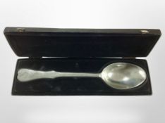 A Norwegian pewter basting spoon in presentation box, length 35cm.