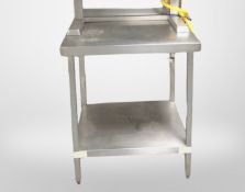 A commercial stainless steel two tier prep table,