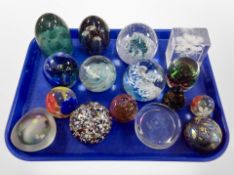 A collection of paperweights including Selkirk, Caithness, Isle of Wight,